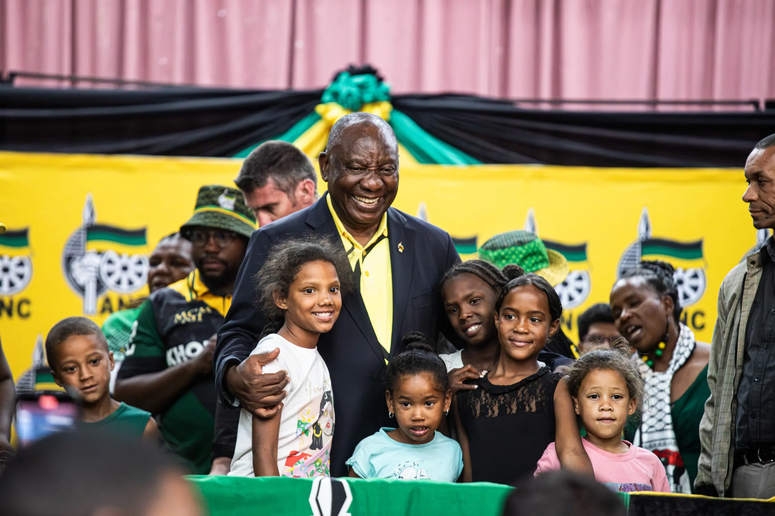 ANC President Cyril Ramaphosa takes a photo with supporters at Dulcie September Civic Centre in Athlone for a cake-cutting celebration to mark the party's 113th birthday. Picture: Kayleen Morgan/EWN ANC President Cyril Ramaphosa takes a photo with supporters at Dulcie September Civic Centre in Athlone for a cake-cutting celebration to mark the party's 113th birthday. Picture: Kayleen Morgan/EWN